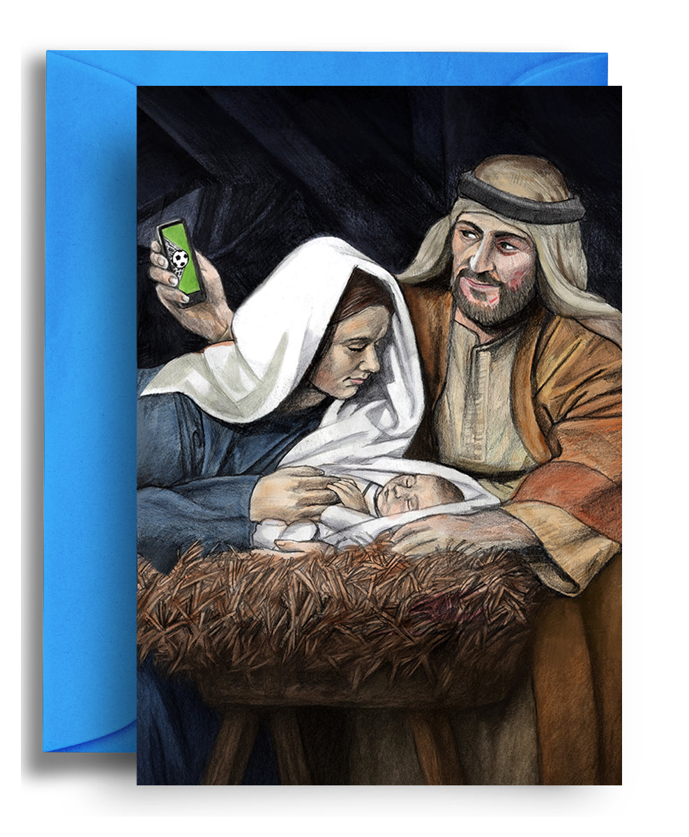 (A) In a Manger – funny football nativity Christmas card